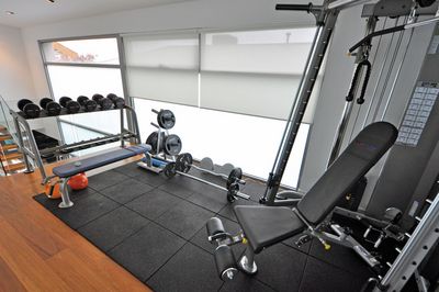 Roller Blind Systems, SG 4910, Basicscreen 1-10%, Room shot "The Fish Tank – Private Residence", Melbourne, Australia